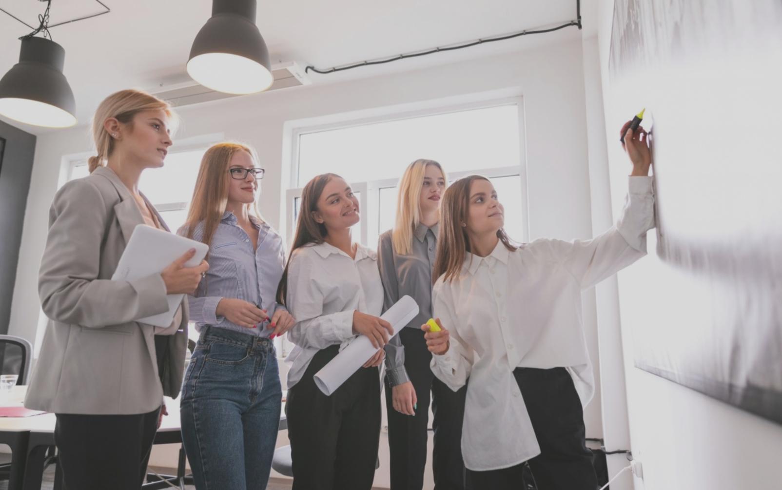 Participant working through personalized budget scenarios on tablet during Oryzanovae workshop